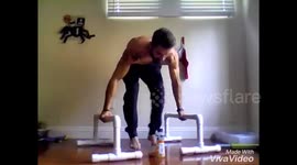 Man performs amazing 'handstand bottle flip challenge'