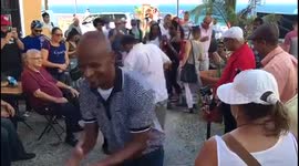Local puerto ricans enjoy a dance to the local music