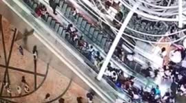 Mall escalator suddenly reverses injuring 18 in Hong Kong