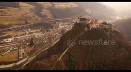 Aerial shot, a small perched town Chiusa in Italy, Sud Tirol, in the middle of the vineyards, 4K