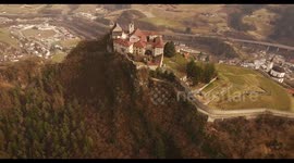 Aerial shot, a small perched town Chiusa in Italy, Sud Tirol, in the middle of the vineyards, 4K