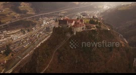 Aerial shot, a small perched town Chiusa in Italy, Sud Tirol, in the middle of the vineyards, 4K