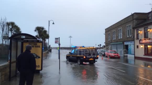 Penzance roads to the promenade closed during high tide