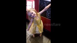 Cute girl has hilarious reaction after seeing Beauty and the Beast