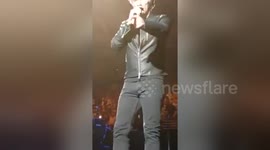 Newsflare Edit - Bon Jovi pulls fan up on to sing and he nails it