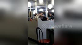 Tensions flare as customer and staff argue at Chicago waffle house