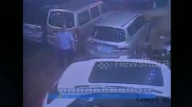 Driver tries to park car, crashes into hotel