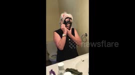 Grandma has a nightmare trying to peel off charcoal face mask