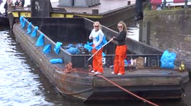 Litter girls get pelted at Amsterdam's King's Day event