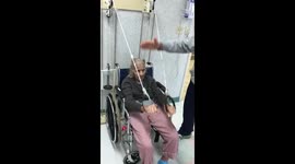 109 year old grandma doing exercise to keep fit with the help of her son