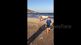 Boy loves his first time paddle boarding...NOT