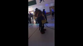 Girl attends dance with Beauty and the Beast character while father is overseas