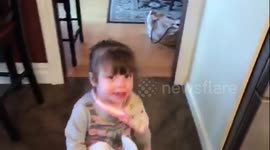 Cheeky little girl blames her doll for making a mess