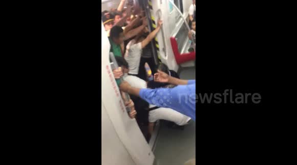 Elderly woman rescued after getting leg stuck between train and ...
