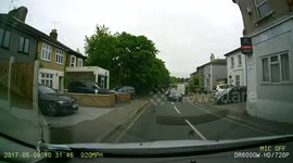 Pupil on driving test with crazy undertake on pavement