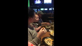 Mom takes food from baby