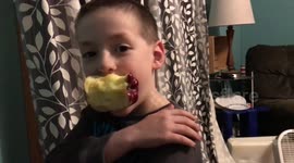 Young boy discovers bug on his arm