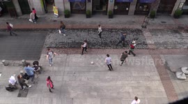 English tourist play Football in Madrid