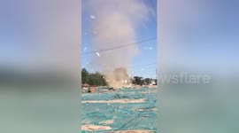 Dust devil blows down temporary house in Beijing