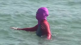 Interesting swimming equipment in China:Face Kini