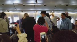Man in Red Trump Make America Great Again Hat Calls Woman a Lesbian on United Flight 87