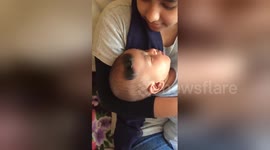 Newsflare Edit - Fidget spinner on baby's head