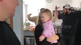 Baby keeps bringing grandpa in for a group hug
