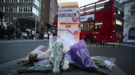 Flowers and other tributes appear around London Bridge
