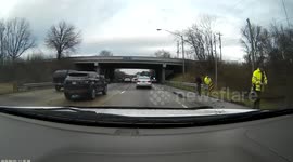 TN State Trooper stuck on bridge underpass after police chase