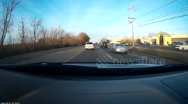 Guy changes lane without checking blind spot or using blinker