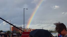 Rainbow appears next to Jeremy Corbyn as he delivers speech