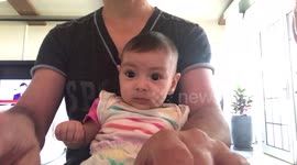 3 month old baby discovering the piano for the first time