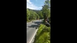 Rider slides across road in Isle of Man TT crash