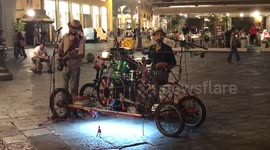 Live band in Florence with a dancing puppet.