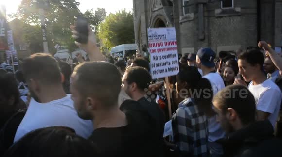 Hundreds of angry protesters gather close to Grenfell Tower