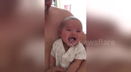 Baby changes emotion with mum's singing