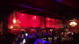 Sharks Inside A Fish Tank At Gentlemen's Club