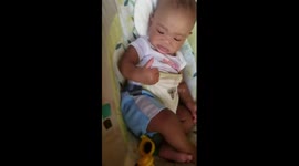 Baby first time eating strawberry