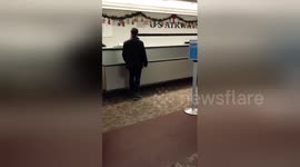 Angry passenger begins to yell at US Airways in Phoenix airport