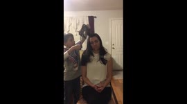 Boy actually cuts mother's hair while filming ASMR video