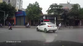 Men using helmets to fight against each other for car crash on the street