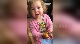 Little girl caught red-handed painting her 'nails' with a pen