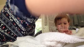 Baby does mummys make up!