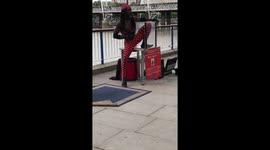 Contortionist squeezes himself into tiny box