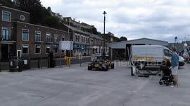 Sports car driver can drive under car park barrier