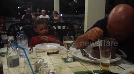 Copying grandad eating.