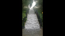 heavy rains creating a waterfall in BayRidge on 76th street brooklyn