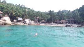 Swimming at the perfect Koh Tao Beach Thailand, Shot by drone