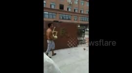 Vendor smashes watermelons outside local government office