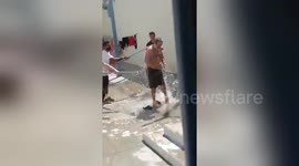 Newsflare Edit - Albanians in Cretan Prison, Greece.